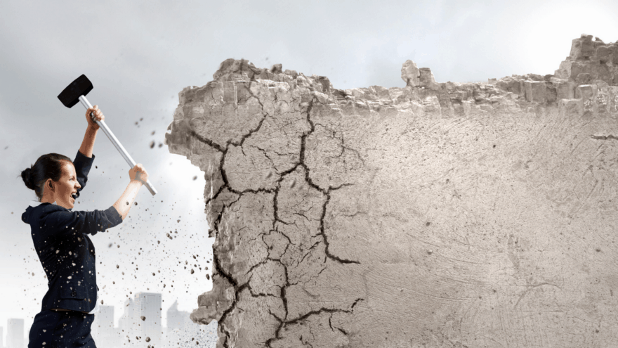 girl breaking wall